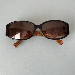 Coach sunglasses, like new. Does not have its original case.